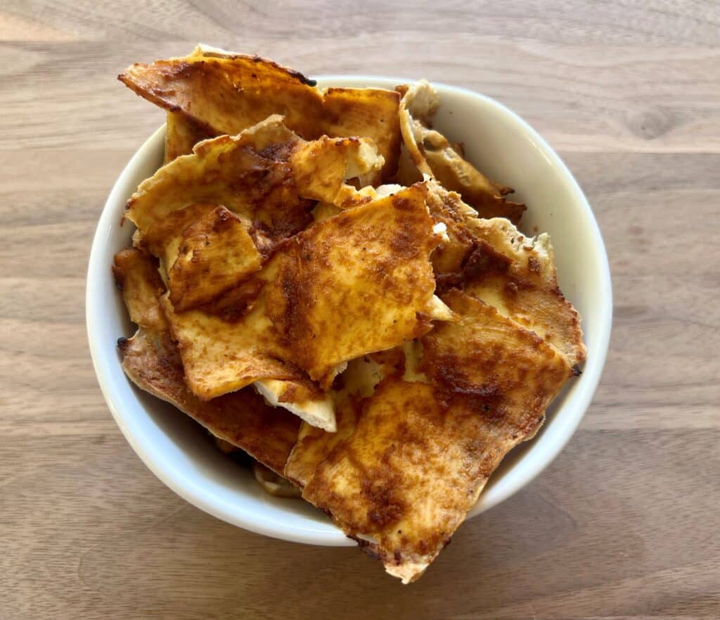 Bowl of cooked vegan tofu deli meat as a healthier option for people with kidney disease.