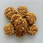 Pile of cooked healthy peanut butter pumpkin cookies.