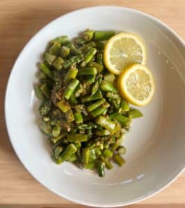 Sauteed asparagus in garlic, salt, pepper and lemon juice.