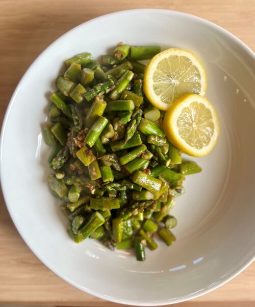 Sauteed asparagus in garlic, salt, pepper and lemon juice.